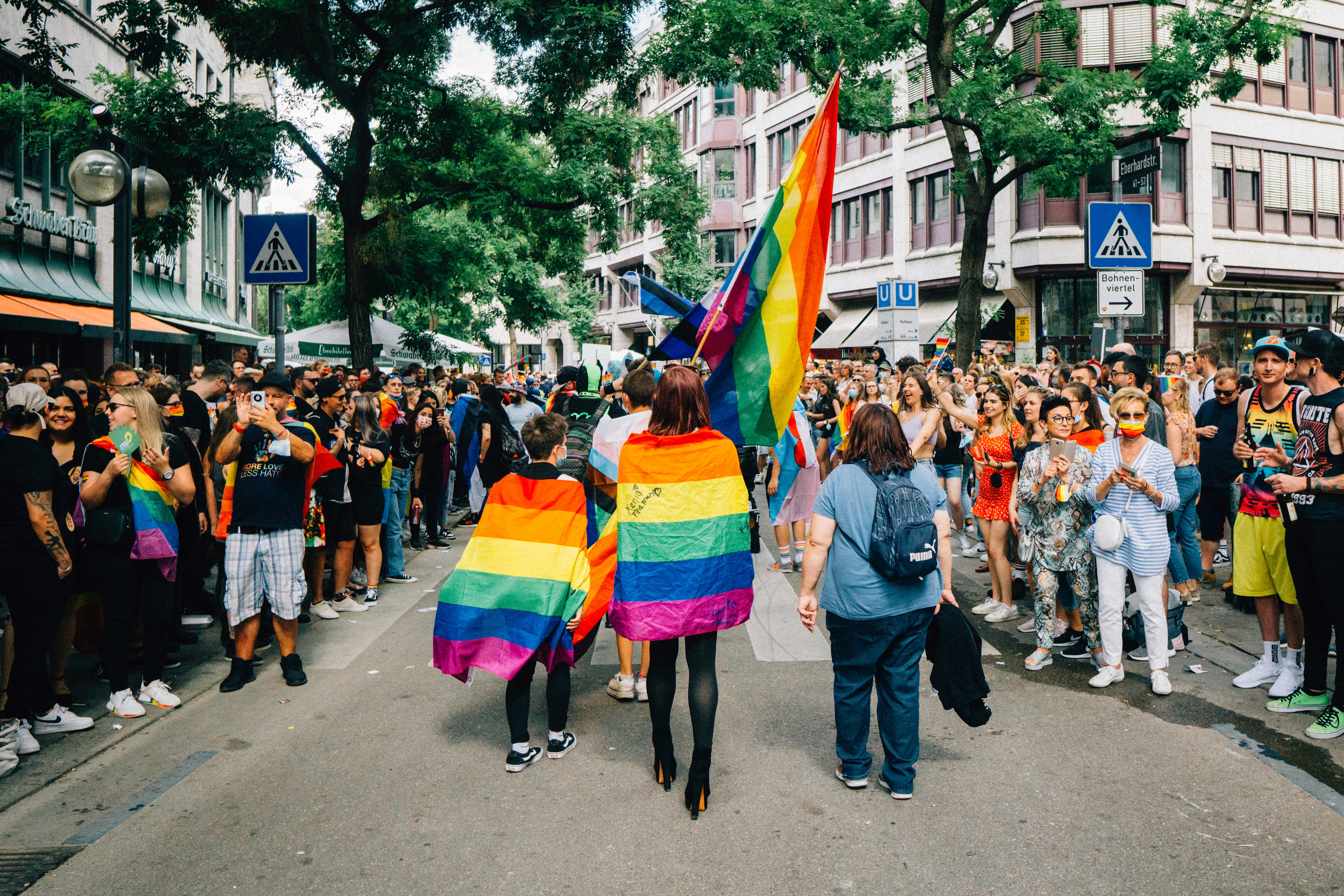 Rear view of pride flag and parade